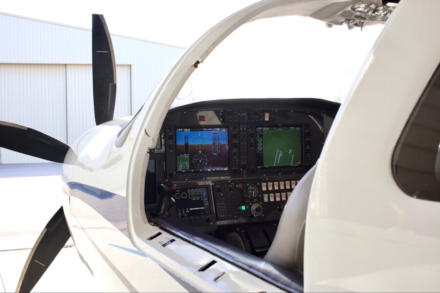 Lancair IV-P cockpit Garmin avionics panel glass cockpit through open canopy