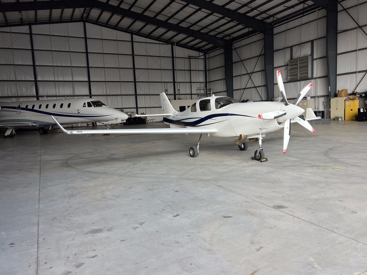 Lancair IV-P JetProp N331TP Garrett TPE-331-6 turboprop full profile view in hangar — 300 knot single engine turboprop